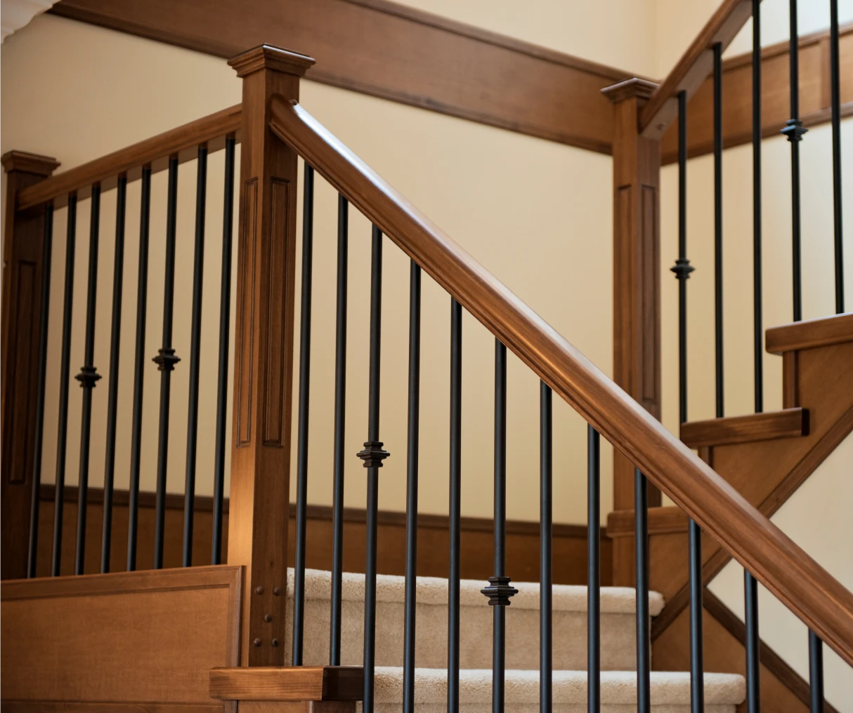 Modern staircase featuring wood and metal
