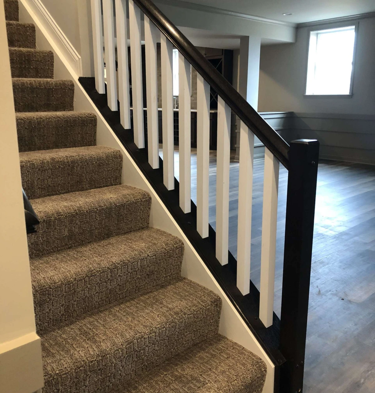 Modern staircase with white balusters
